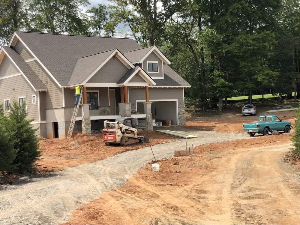 men working on cabin